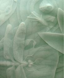 Celadon glazed carved porcelain lidded box